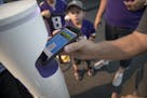 Fans used a new system that reads tickets from a cell phone before the Minnesota Vikings took on the Jacksonville Jaguars at US Bank Stadium, Saturday