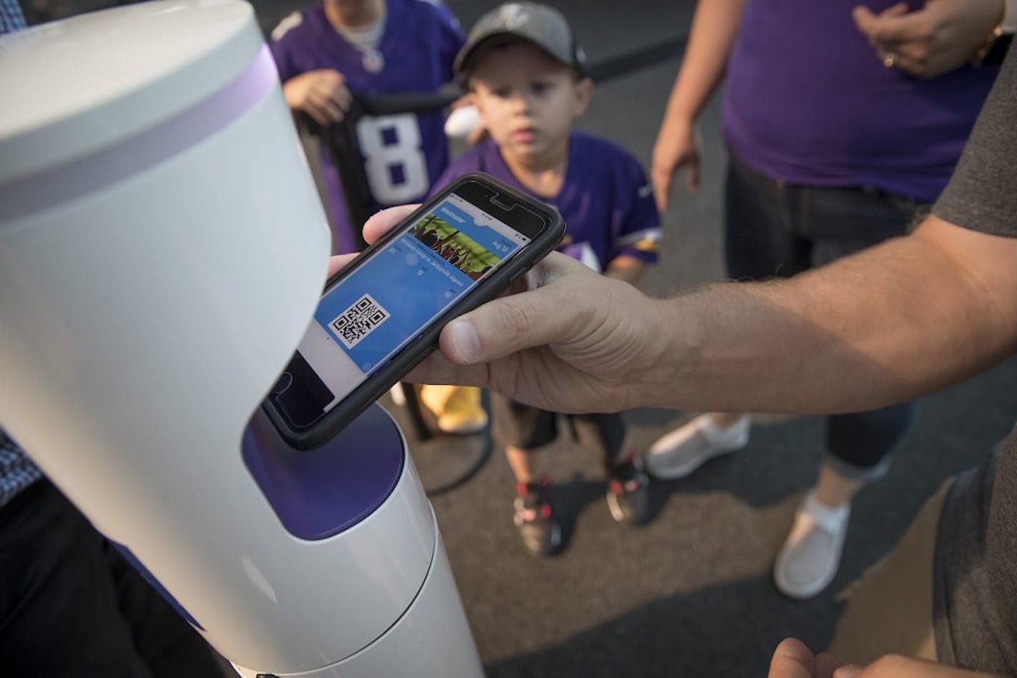 Fans used a new system that reads tickets from a cell phone before the Minnesota Vikings took on the Jacksonville Jaguars at US Bank Stadium, Saturday, August 18, 2018 in Minneapolis, MN.