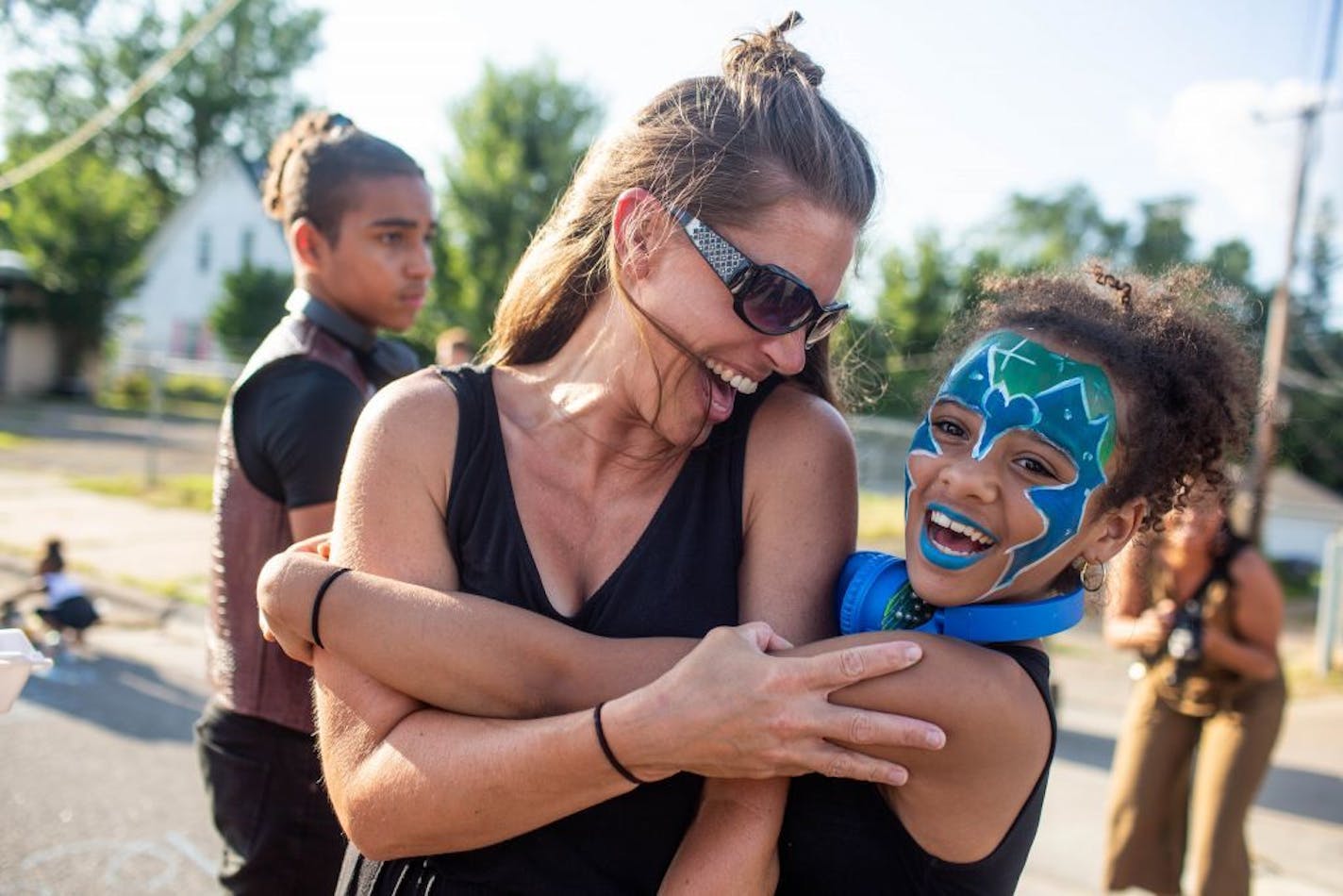 Dani Tietjen, left, joined other Folwell residents to make changes in the neighborhood association, including more outreach.