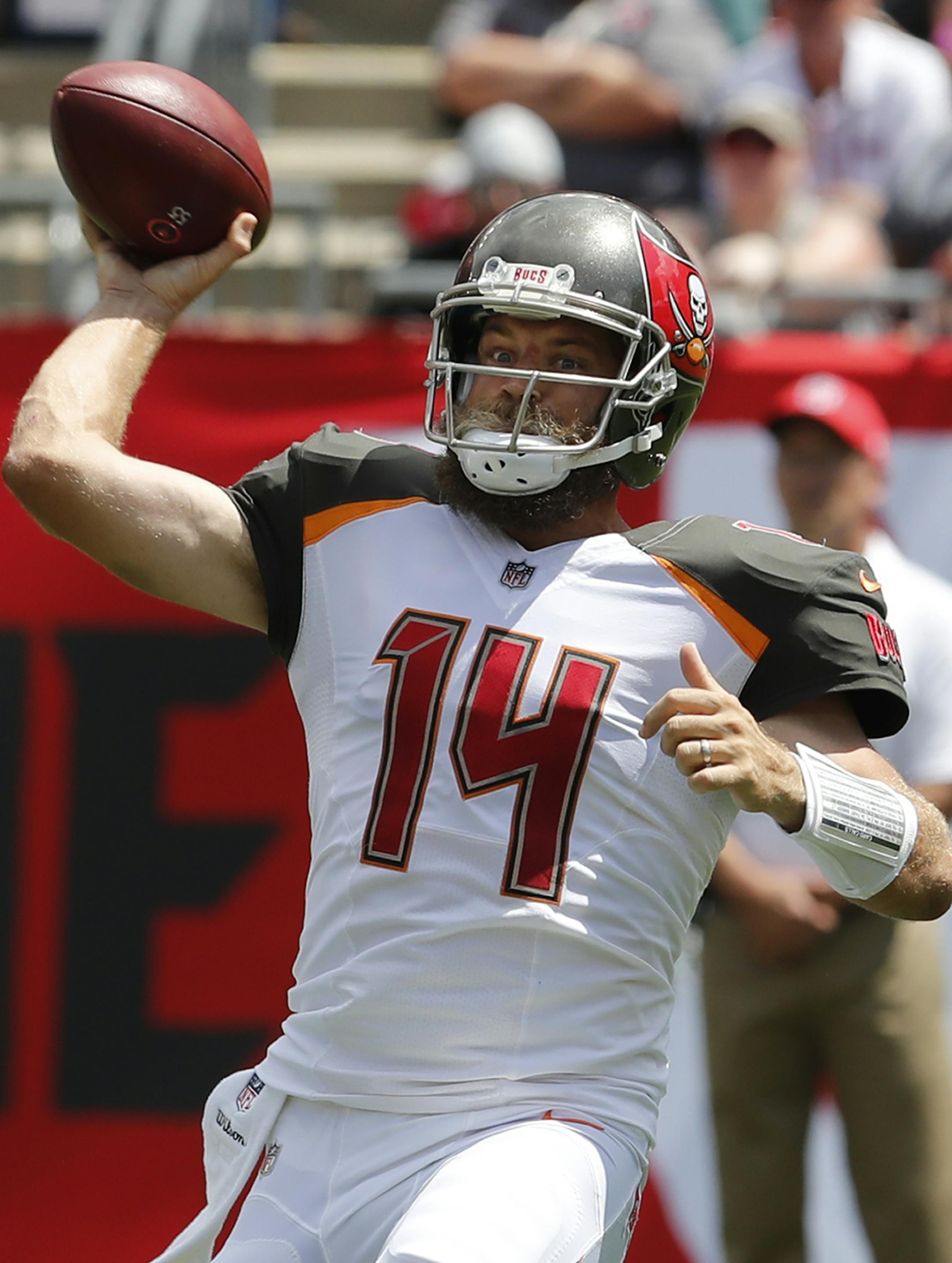 Tampa Bay Buccaneers quarterback Ryan Fitzpatrick (14) looks to pass, during the first half of an NFL football game against the Philadelphia Eagles, Sunday, Sept. 16, 2018, in Tampa, Fla. (AP Photo/Mark LoMoglio)