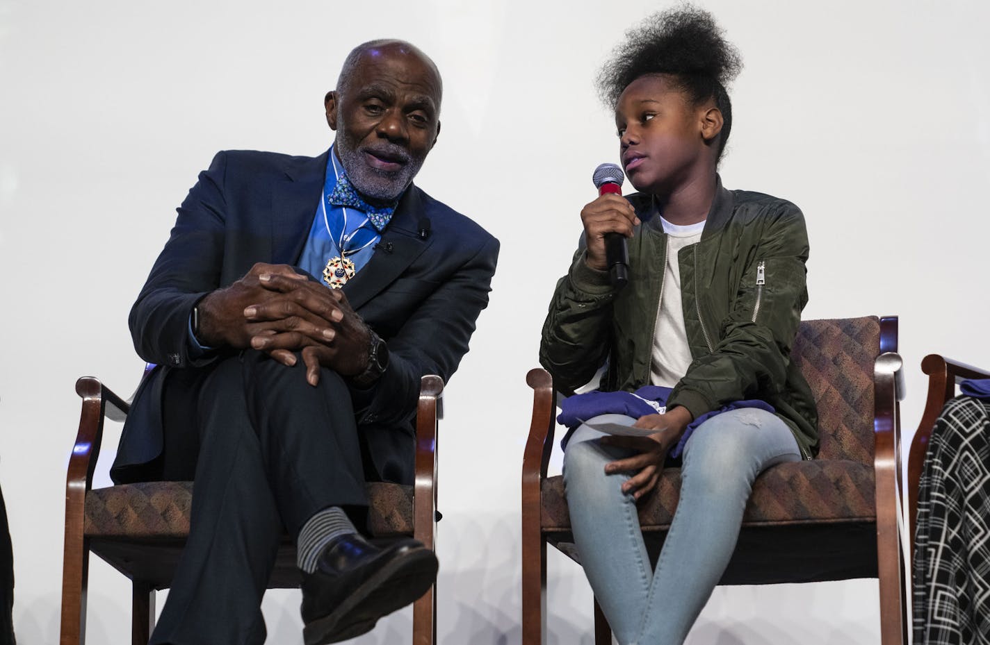 Justice Alan Page listened to a question by Junior Page Scholar E'Rayah Shaw during a celebration for Page at Justice Page Middle School after he received the Medal of Freedom on November 19, 2018 in Minneapolis, Minn. ] RENEE JONES SCHNEIDER &#x2022; renee.jones@startribune.com