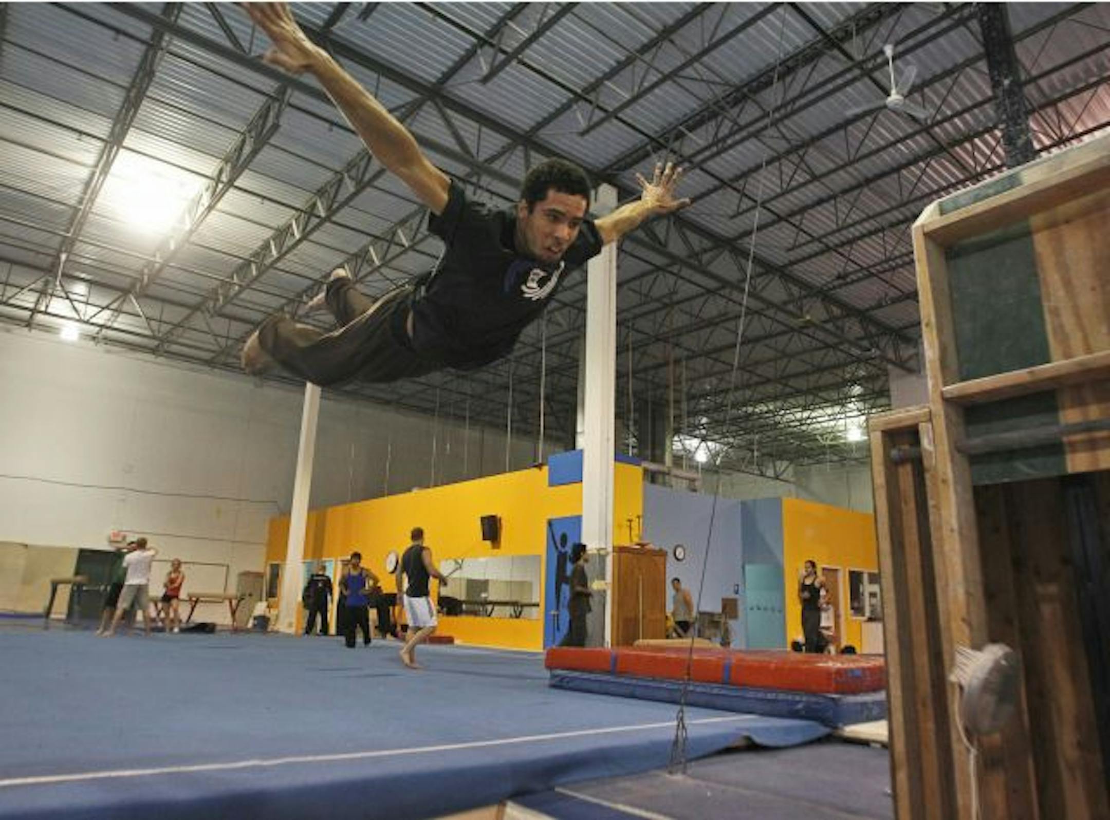 Collin Cooper dove into a pit of foam during parkour training at Gleason's Gymnastics in St. Paul