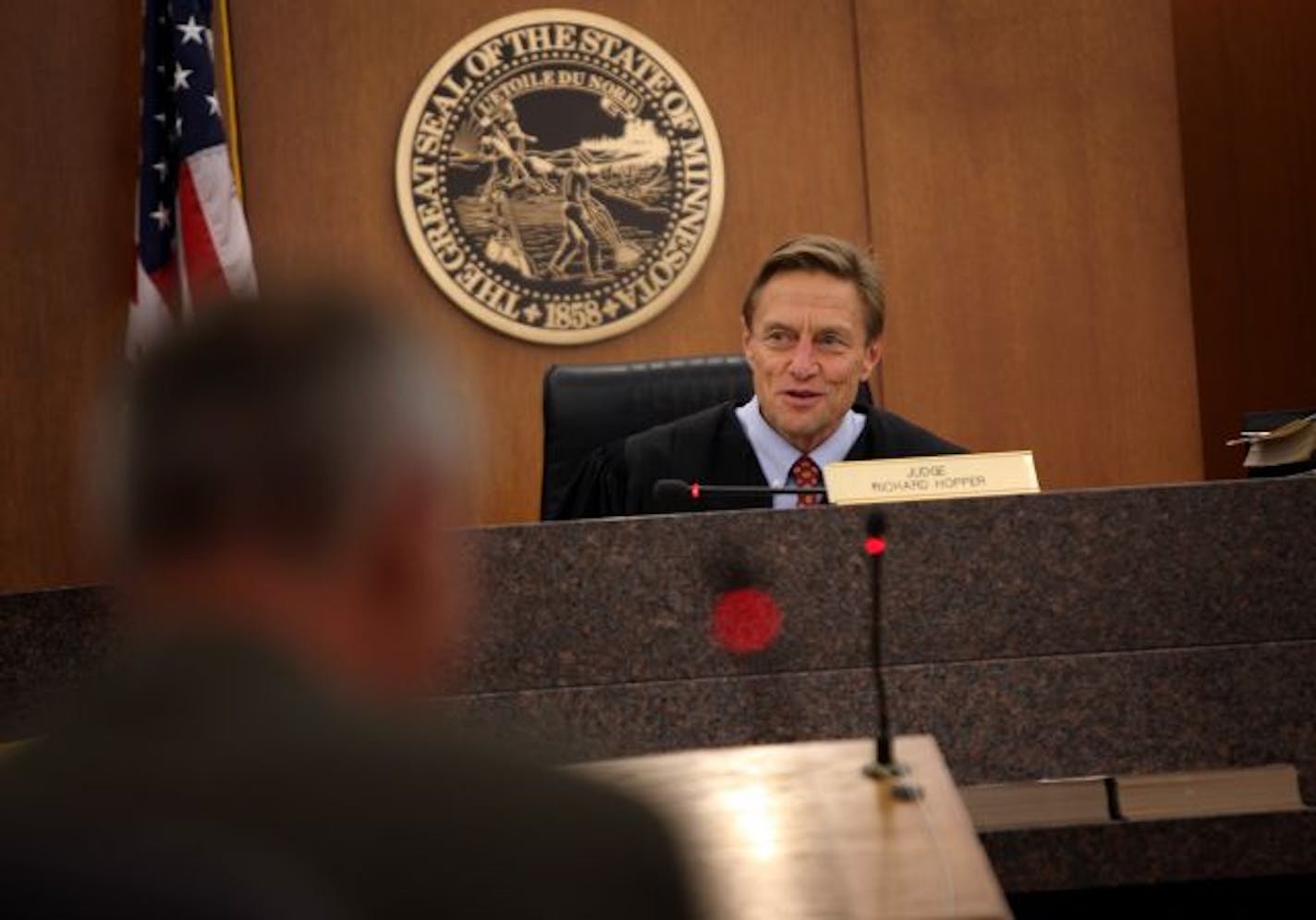 Judge Richard Hopper presides over hearings in a pilot project focused on veterans. The court is in response to the realization that veterans may benefit from specific interventions and plans.