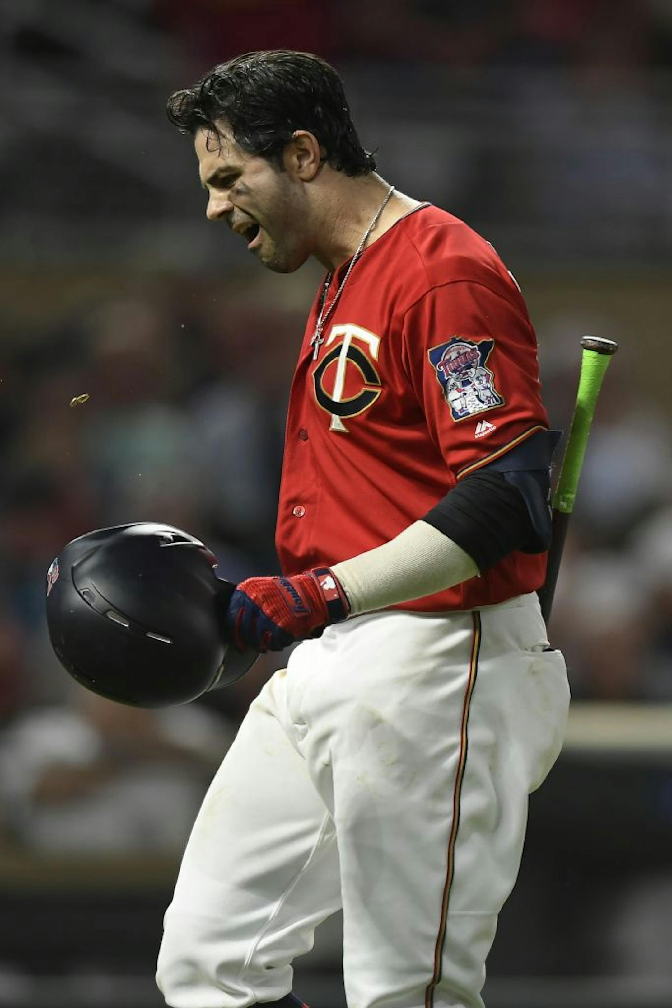 Minnesota Twins center fielder Ryan LaMarre (27) reacted after being struck out swinging to end the sixth inning against the Kansas City Royals.