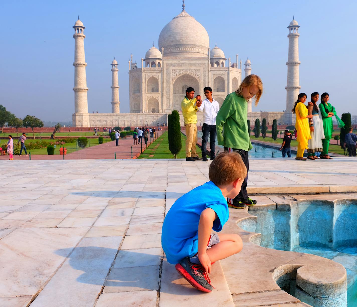 With one of the wonders of the world behind them, 6-year-old Ellis Wangerin, front, and Theron Wangerin, 10, checked out the pools and fountains of the Taj Mahal complex.