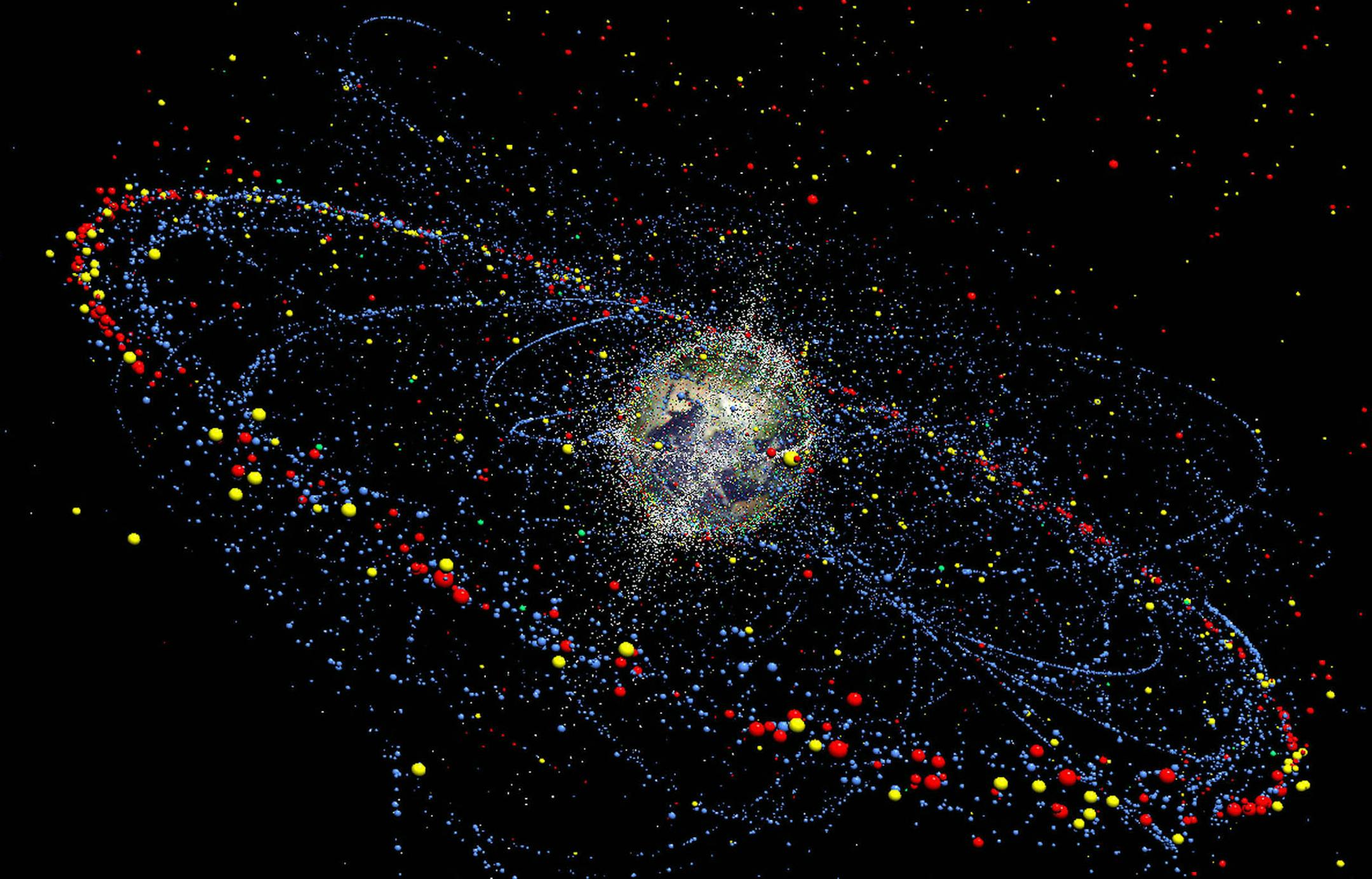 FILE - An undated handout photo for the European Space Agency ESA shows a computer simulation made by the Institute for Air and Spacesystems at the Technical University of Braunschweig, Germany, of the distribution and movement of space debris at present and in future. (AP Photo/TU Braunschweig, File) ORG XMIT: MIN2013042510022131
