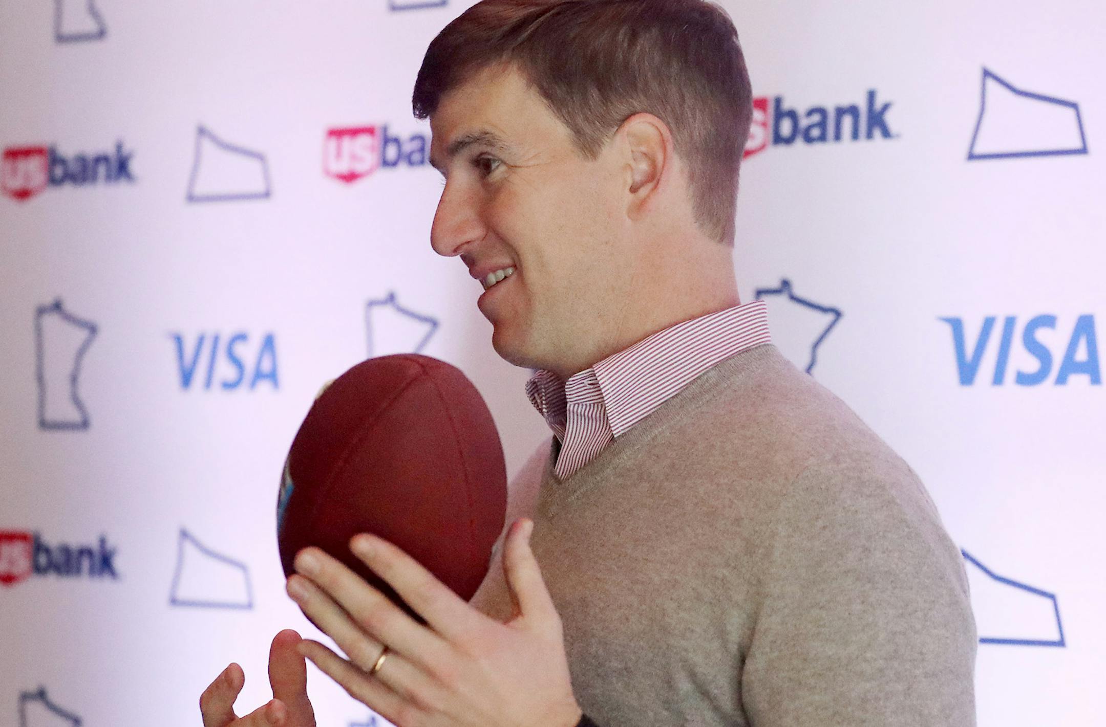 New York Giants quarterback Eli Manning, tosses a football in the air during an appearance at the U.S. Bank "Possibilities Lounge" in McCormick & SchmickThursday, Feb. 1, 2018, in downtown Minneapolis, MN. ] DAVID JOLES ï david.joles@startribune.com More than any other local company, US Bancorp staked a lot on the Super Bowl