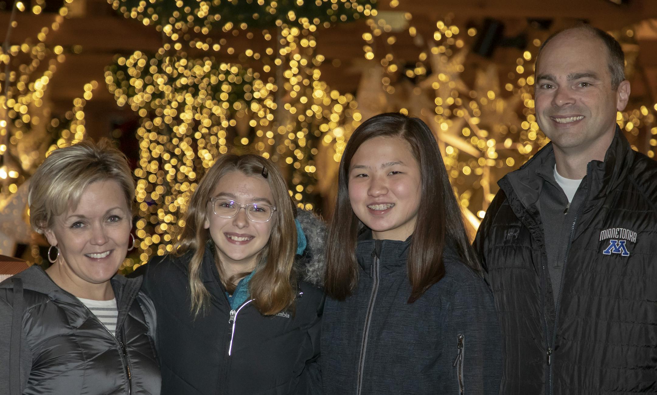 Kristin Simonsen, Julia Constantineau, Riley Pudwill and Matt Simonsen at the 2019 Winter in Bloom exhibit at the Minnesota Landscape Arboretum. [ Special to Star Tribune, photo by Matt Blewett, Matte B Photography, matt@mattebphoto.com, Minnesota Landscape Arboretum, Winter in Bloom, Minnesota, SAXO 1009874394 FACE120819