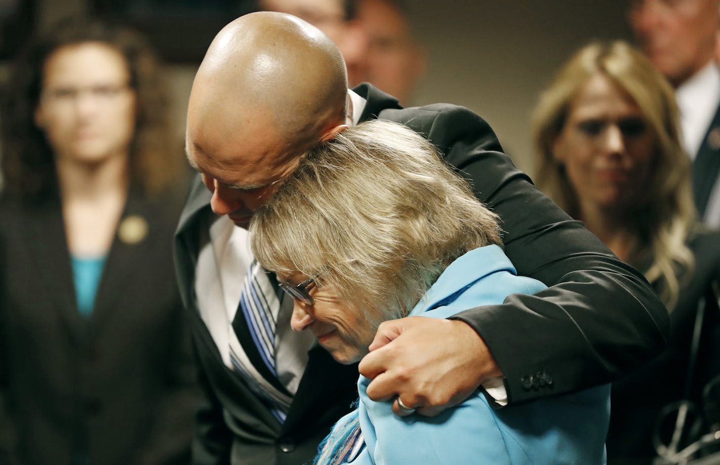 Patty Wetterling was consoled by son Trevor on Tuesday after Danny Heinrich admitted abducting and killing her son Jacob.