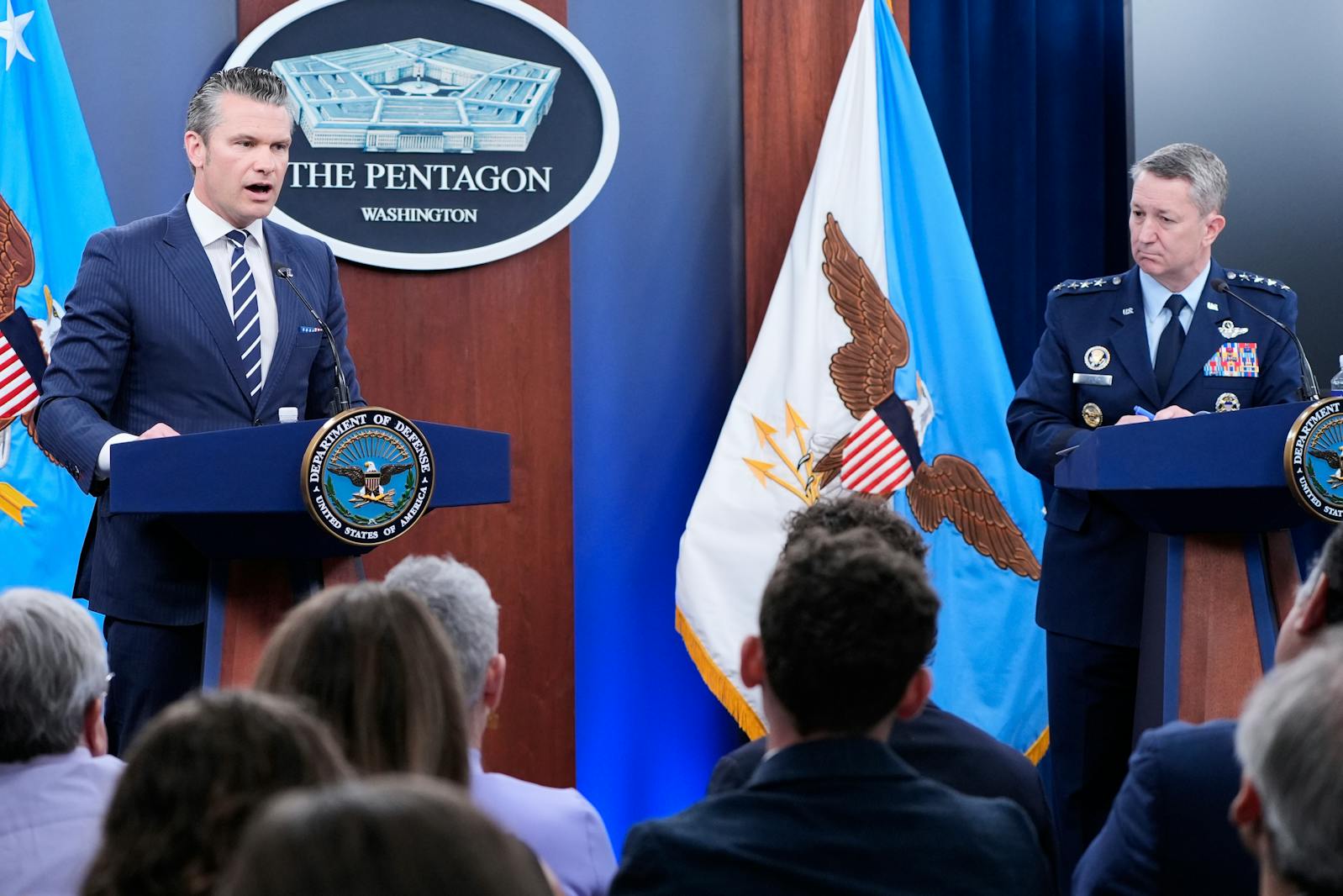Defense Secretary Pete Hegseth and Joint Chiefs Chairman Gen. Dan Caine speak during a news conference at the Pentagon in Washington, Sunday, June 22, 2025, after the U.S. military struck three sites in Iran, directly joining Israel's effort to destroy the country's nuclear program.