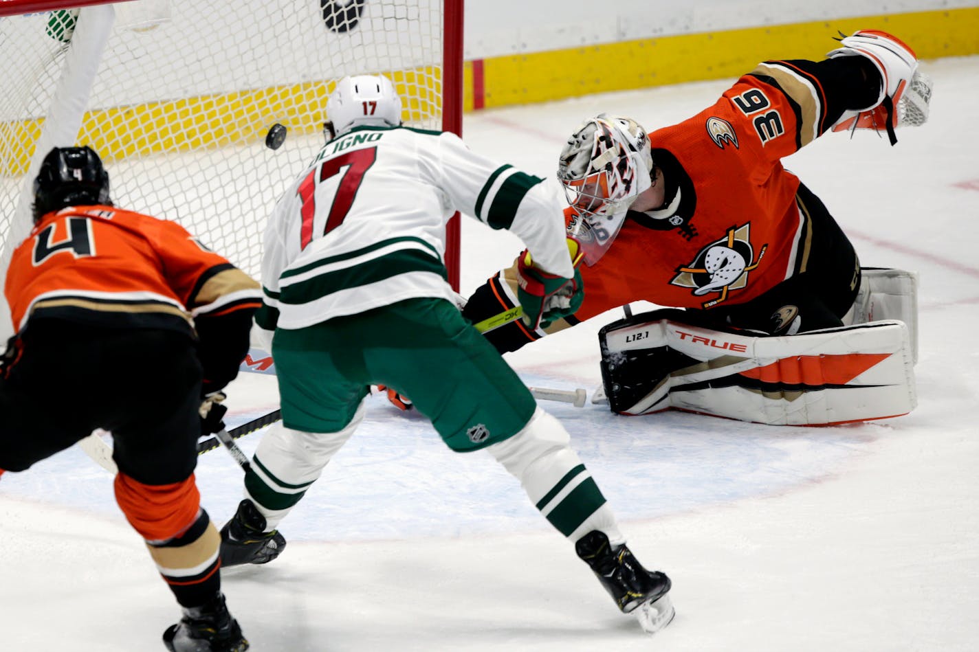 Wild left wing Marcus Foligno scores against Anaheim goaltender John Gibson in the third period.