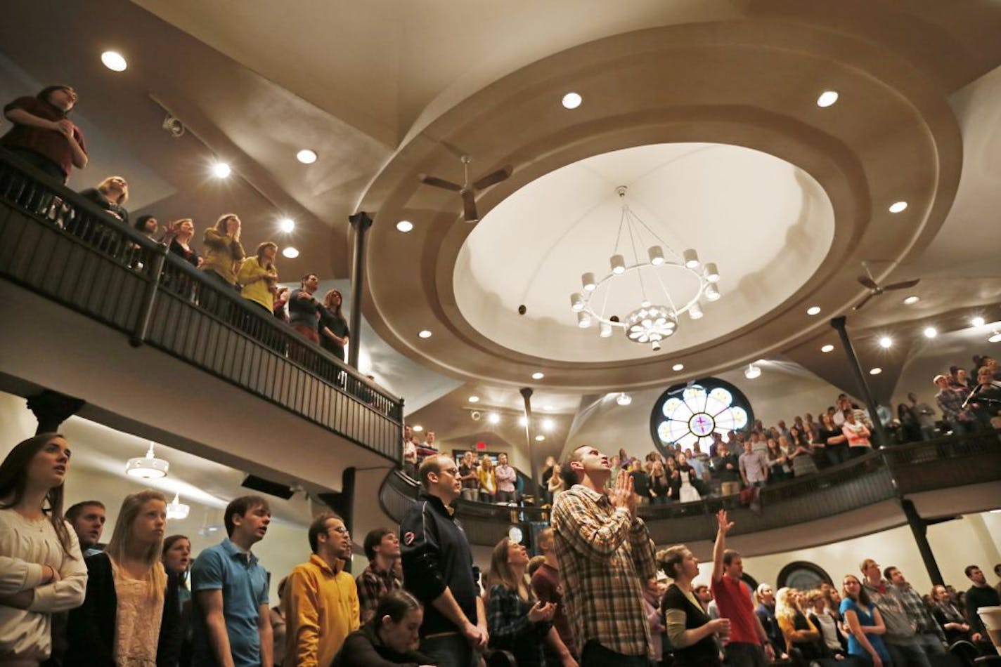 Members of the Hope Community Church worshiped Sunday, January 27, 2013 in Minneapolis, MN. Hope is one of four old, brick churches built in the 1800's standing the in the shadow of the Metrodome.