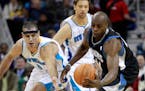 Anthony Tolliver (right), who played for the Timberwolves from 2010-12, is back with the team and is expected to improve the club's three-point shooti