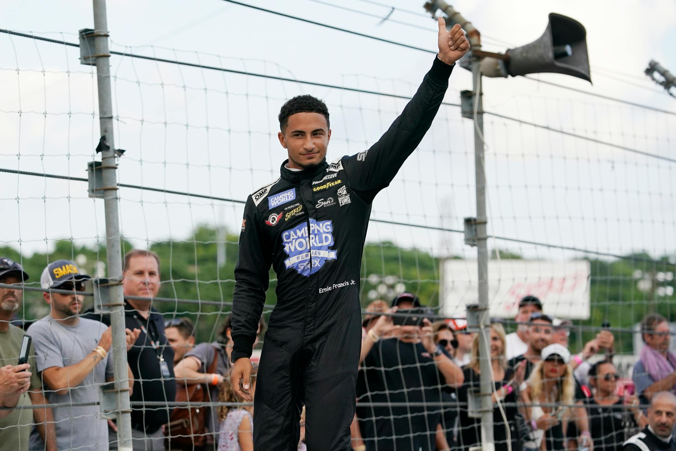 Ernie Francis Jr. is introduced before an SRX Series auto race Saturday, July 17, 2021, in Nashville, Tenn. (AP Photo/Mark Humphrey)