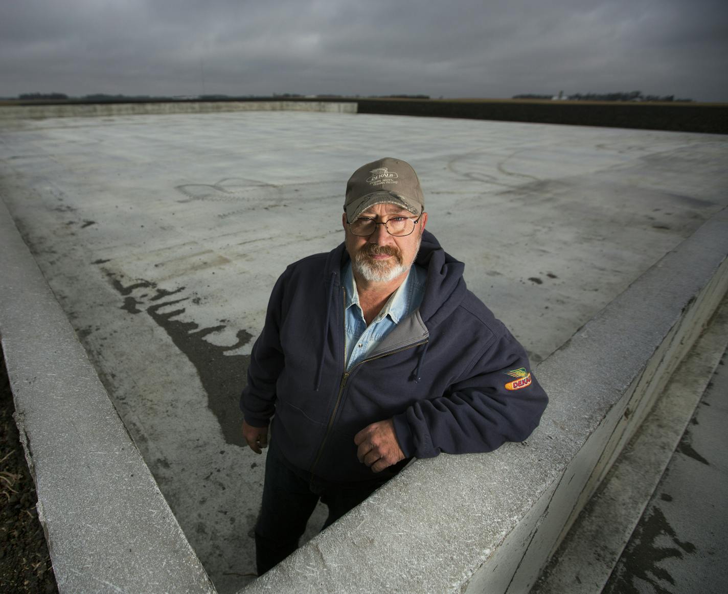 Farmer Ken Schefers stands in his recently completed concrete manure-stacking pad he built costing $175,000. ] Brian.Peterson@startribune.com Paynesville, MN - 10/30/2015