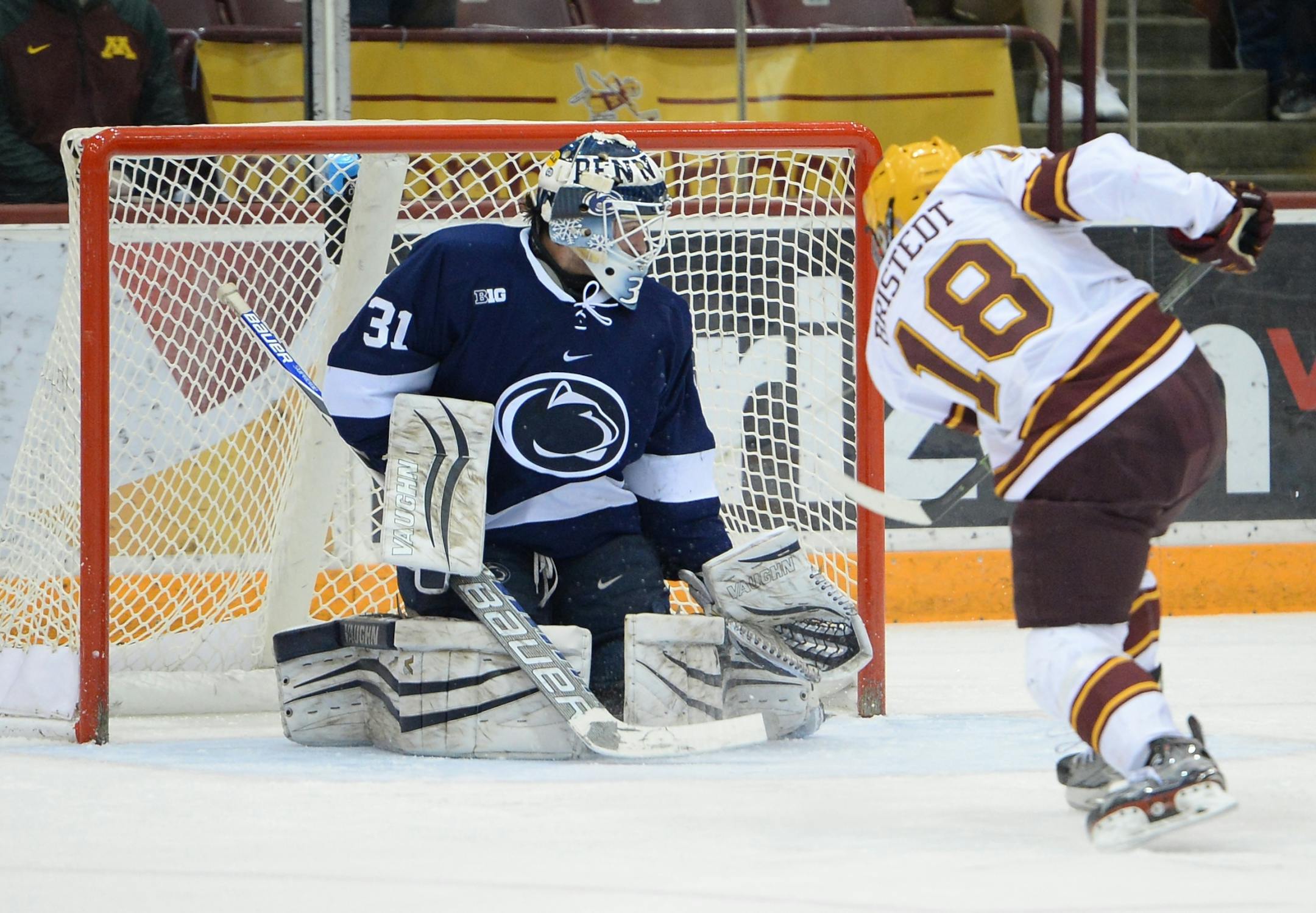 Minnesota Golden Gophers right wing Leon Bristedt (18) scored a goal on Penn State Nittany Lions goalie Matthew Skoff (31) in the third period Friday night.