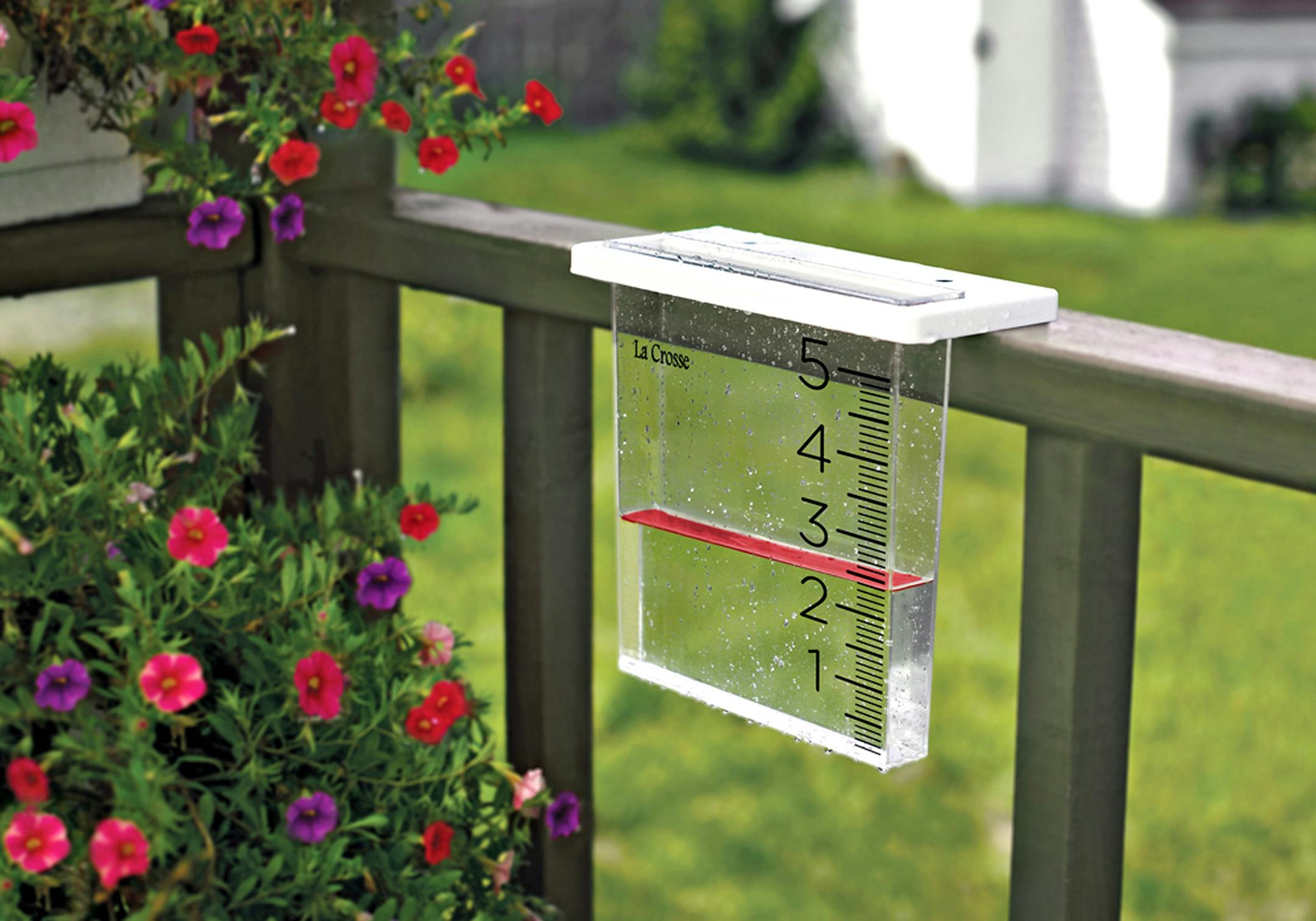 This easy-to-read but restrained rain gauge by La Crosse Technology will hang handily over the railing of a deck or porch outside the window, so a gardener can stay dry and still keep track of how much rain has fallen in the yard. Waterfall Rain Gauge is $19.95 at windandweather.com. (Michael Lieurance Photography/Wind and Weather) ORG XMIT: 1177062