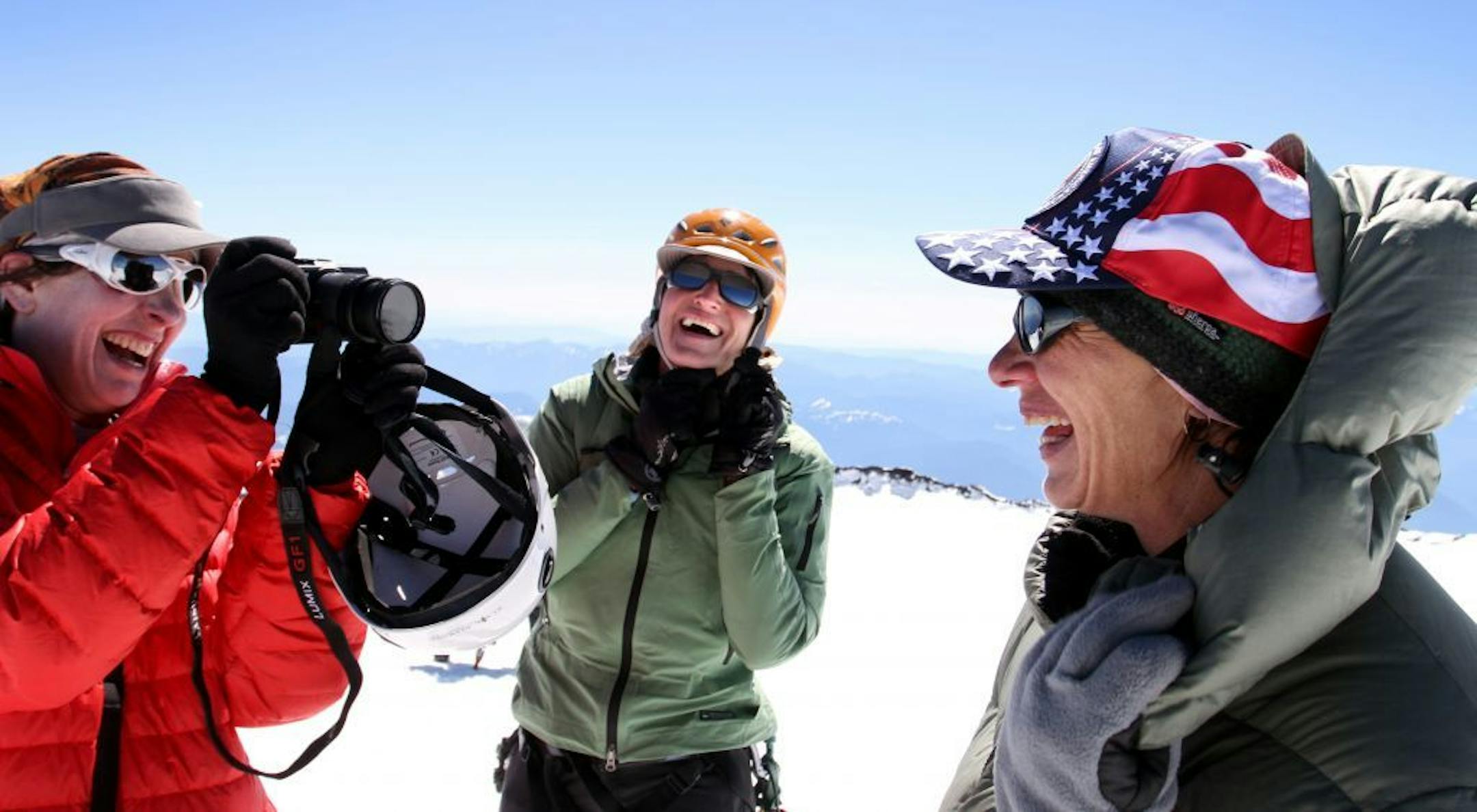 2010 photo: Sally Jewell (center), then CEO of the REI outdoors gear company, pauses after climbing the Emmons Glacier with friends.