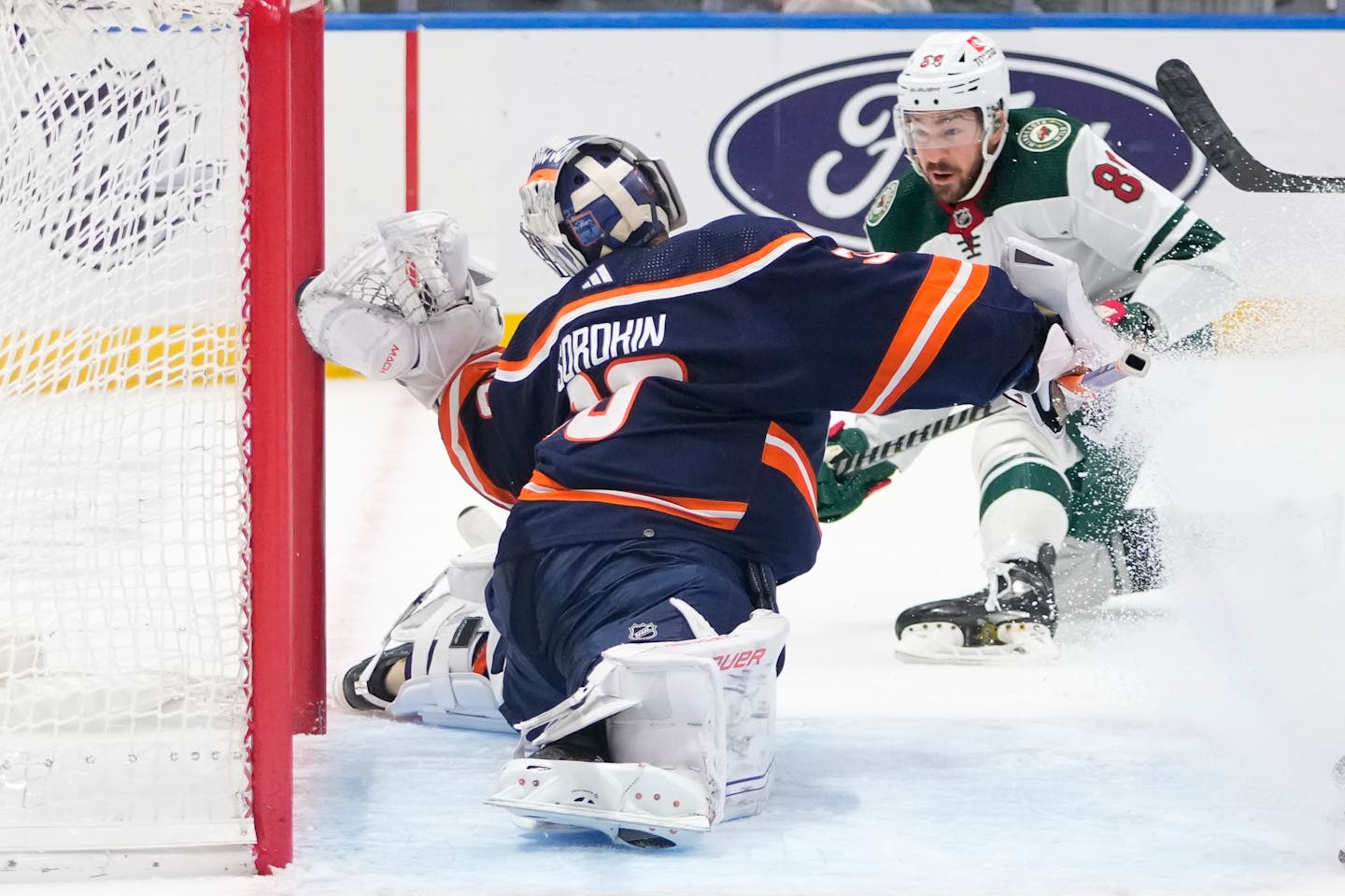 Minnesota Wild's Frederick Gaudreau (89) shoots the puck past New York Islanders goaltender Ilya Sorokin (30) during the third period of an NHL hockey game Thursday, Jan. 12, 2023, in Elmont, N.Y. The Wild won 3-1. (AP Photo/Frank Franklin II)