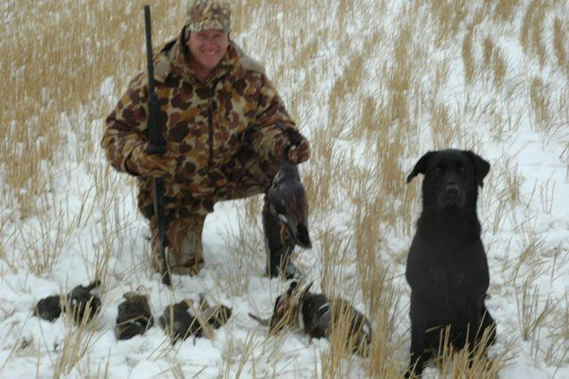 My boys Jon and Doc pose with the harvest of a morning's work.
