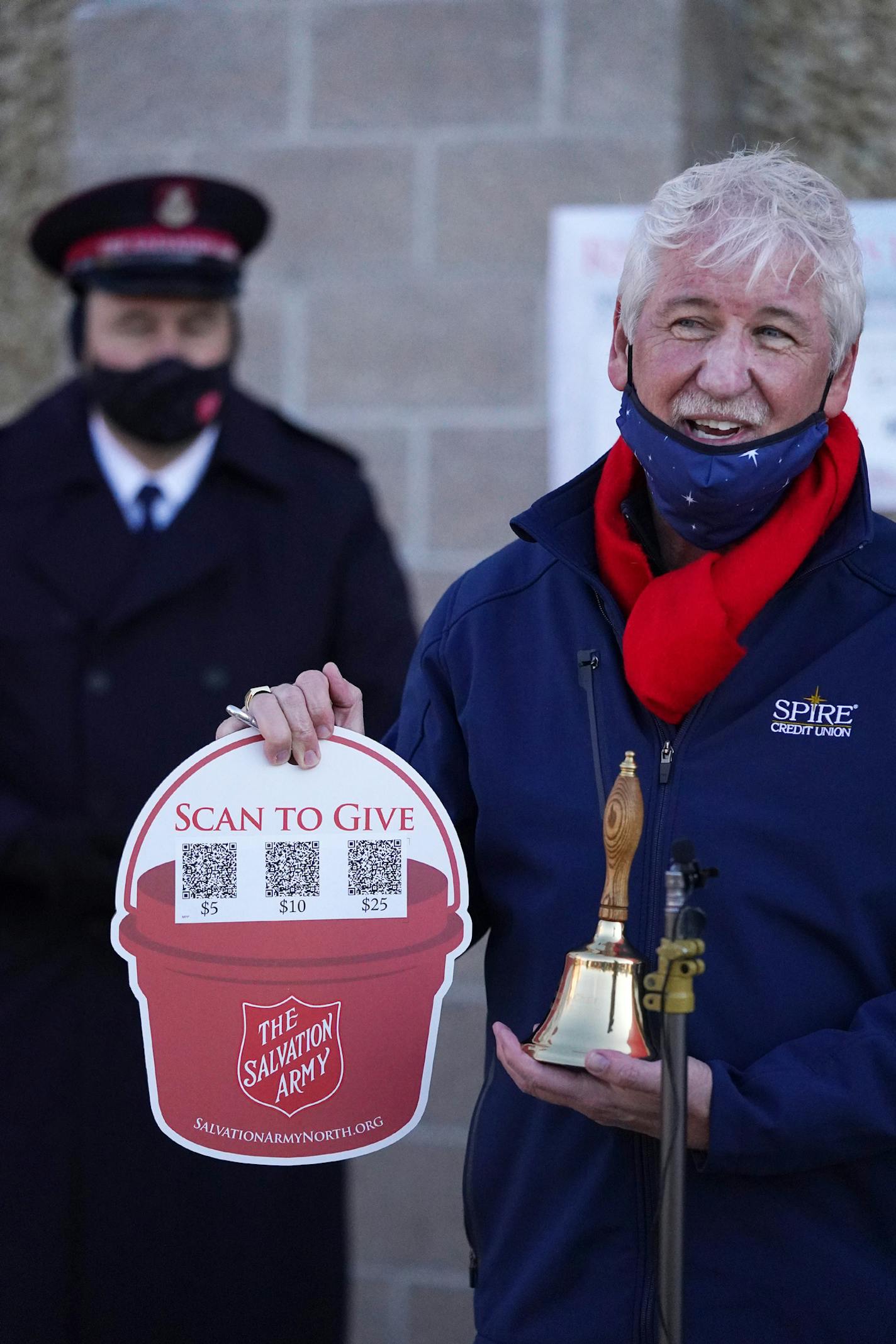 Salvation Army 2020 Red Kettle Community Chair Dan Stoltz, also the President and CEO of SPIRE Credit Union, ran the opening bell during a press conference to kick off the 2020 Red Kettle season Nov. 13. ] ANTHONY SOUFFLE • anthony.souffle@startribune.com