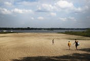 Aug. 29, 2013: Receding lake levels on White Bear Lake have left behind a giant sand beach at West Park Memorial Beach.