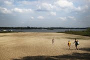 Aug. 29, 2013: Receding lake levels on White Bear Lake have left behind a giant sand beach at West Park Memorial Beach.