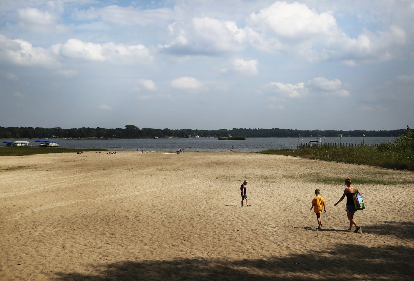 Aug. 29, 2013: Receding lake levels on White Bear Lake have left behind a giant sand beach at West Park Memorial Beach.