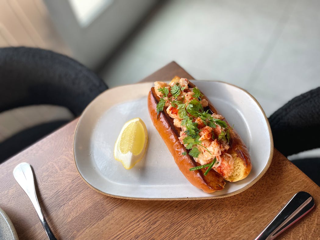 A $30 lobster roll is a hot dog bun brimming with tarragon-seasoned, buttery lobster.