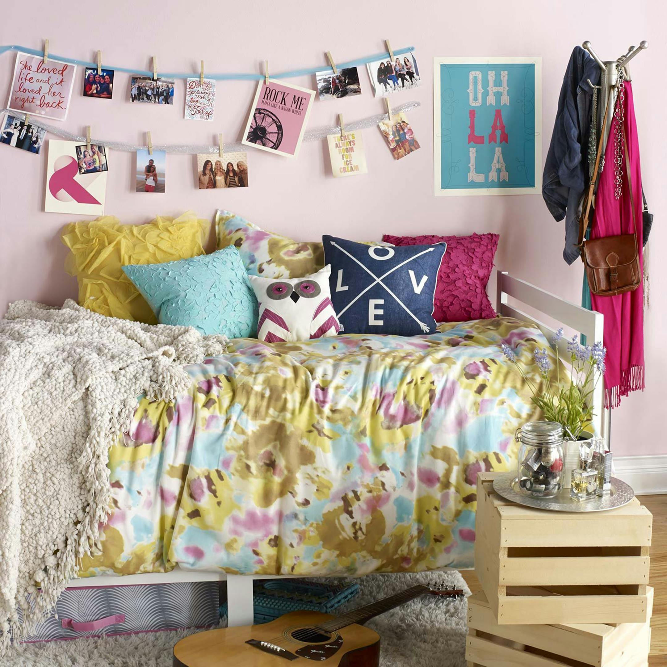 In the small space of a shared dorm room, you must utiliize all spaces over, under and around furniture, and even on the walls. By making the bed the focal point of the room, half your decorating dilemma is solved, as with this Taylor Swift-themed arrangement. (Dan Whipps Photography/Courtesy of Dormify/MCT)