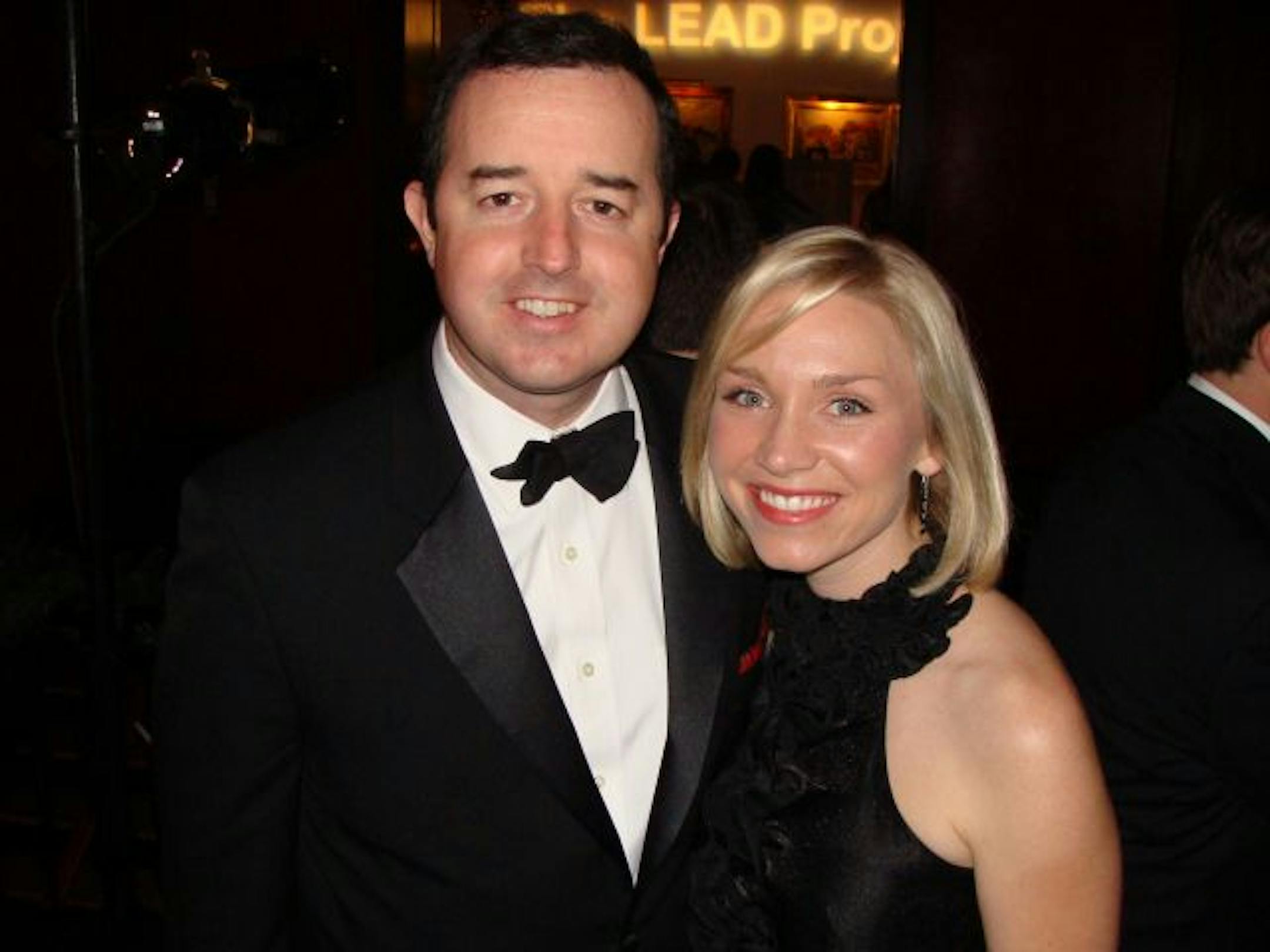 Outgoing board member James Delaney and Katie Clark.