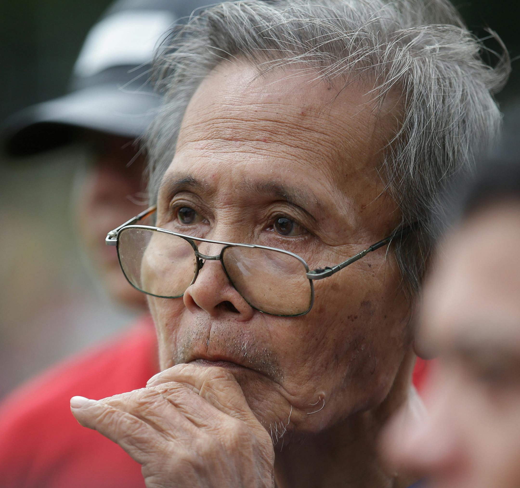 In this Sunday, Sept. 29, 2013 photo, an elderly Filipino man walks at Rizal Park, in Manila, Philippines. Much of the world is not prepared to support the ballooning population of elderly people, including many of the fastest-aging countries, according to a global study scheduled to be released Tuesday, Oct. 1, by the United Nations and an elder rights group. (AP Photo/Aaron Favila)