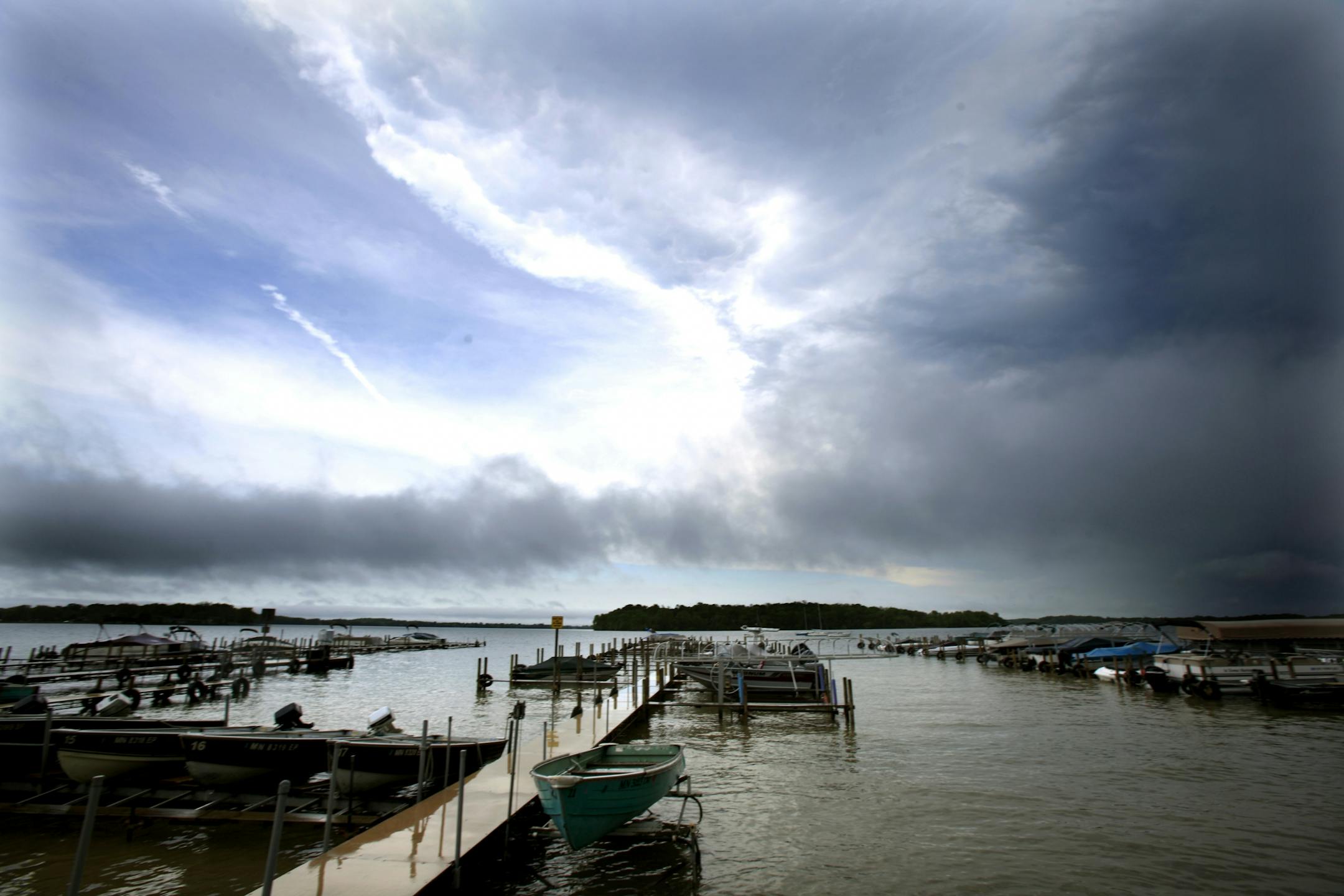 The sky started to clear over Lake Waconia at Mase's In Towne Marina after a rain storm passed thru on May 3, 2012.