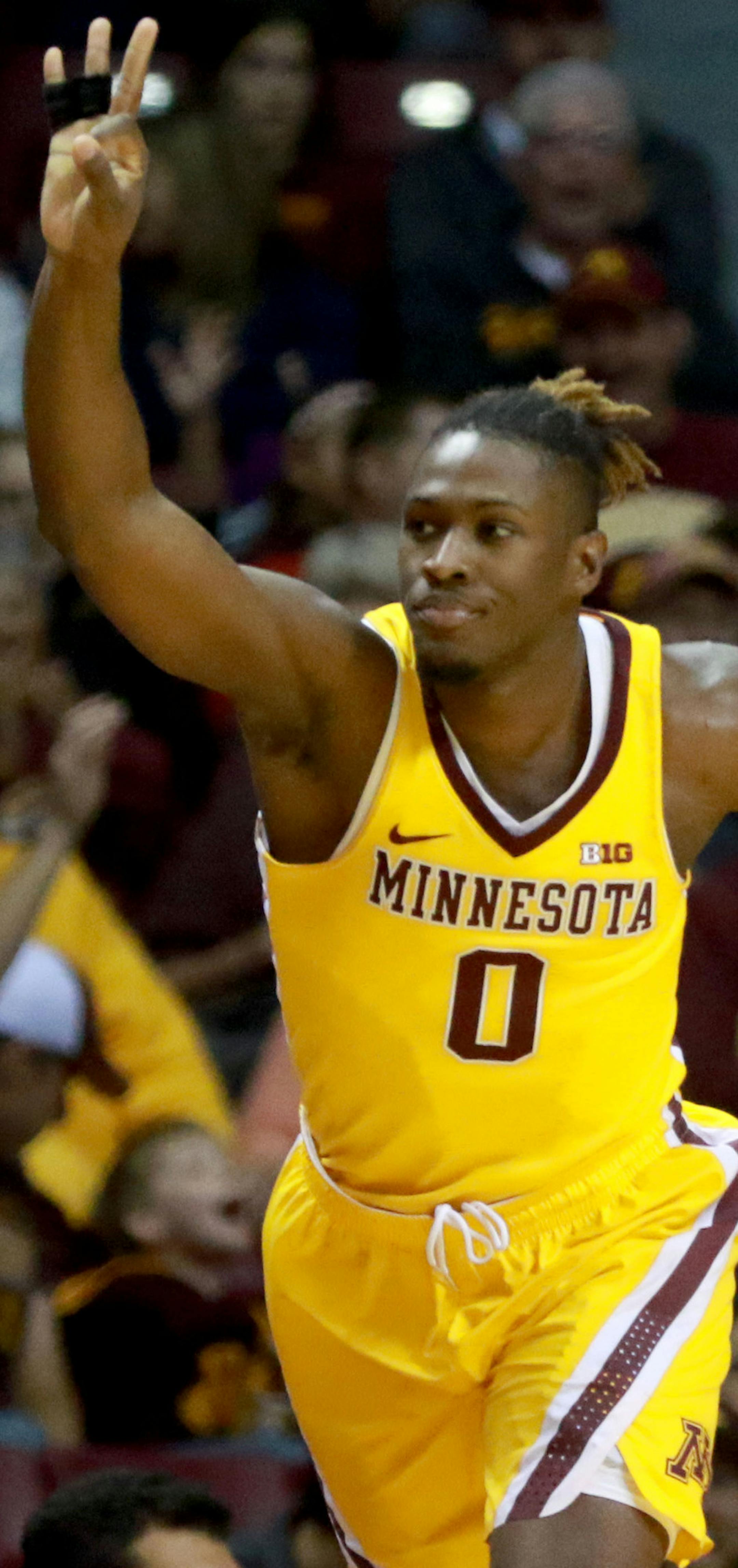 The University of Minnesota's Akeem Springs (0) signals after hitting a three point shot against La.-Lafayette during the first half at Williams Arena on the University of Minnesota campus in Minneapolis, MN. (DAVID JOLES/STARTRIBUNE)djoles@startribune.com Gophers game vs. La.-Lafayette