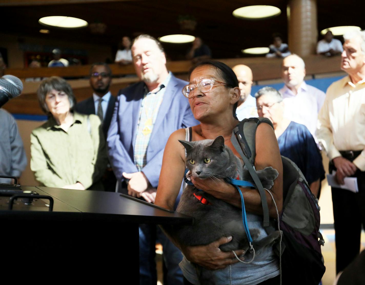 Mayor Jacob Frey and leaders from the American Indian community, among others, will outline their plan to assist people living in a homeless encampment near Hiawatha and Cedar Avenues in south Minneapolis. The encampment of mostly American Indians has grown rapidly in size, raising health and safety concerns. Here, Gretchen Nickence, 54, who has been homeless off and on for 20 years, held her cat Maaingan as she talked about her plight Thursday, Aug. 23, 2018, at the Minneapolis American Indian