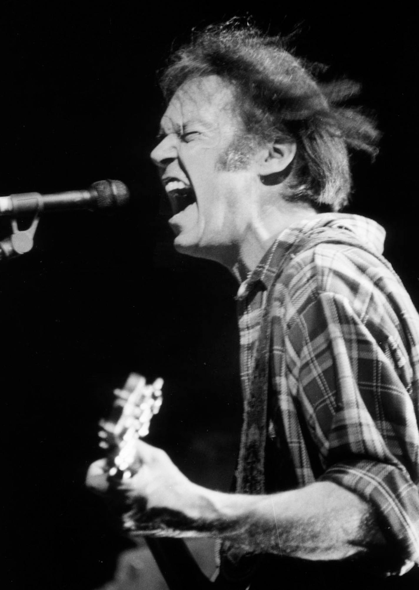 Neil Young, musician, singer, songwriter, sings at the Target Center in Minneapolis, January 22, 1991. Star Tribune staff photo by Brian Peterson. ORG XMIT: MIN2018121322374466