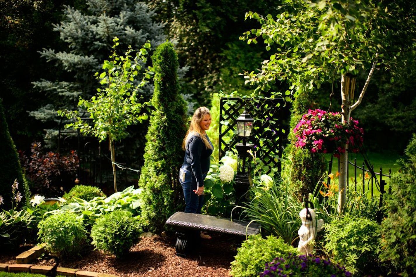 Retired science teacher Deb Dunn-Silis shares her well-manicured Lakeville gardens and knowledge with students and neighbor kids. Deb Dunn Silis gives us a tour of her gardens - include a pond, bridge and sunny and shade beds.