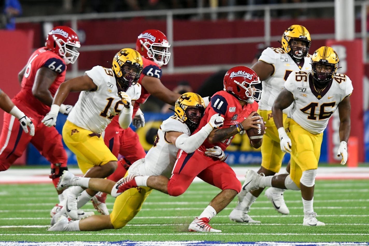 Gophers linebacker Carter Coughlin sacked Fresno State quarterback Jorge Reyna during a game earlier this season.