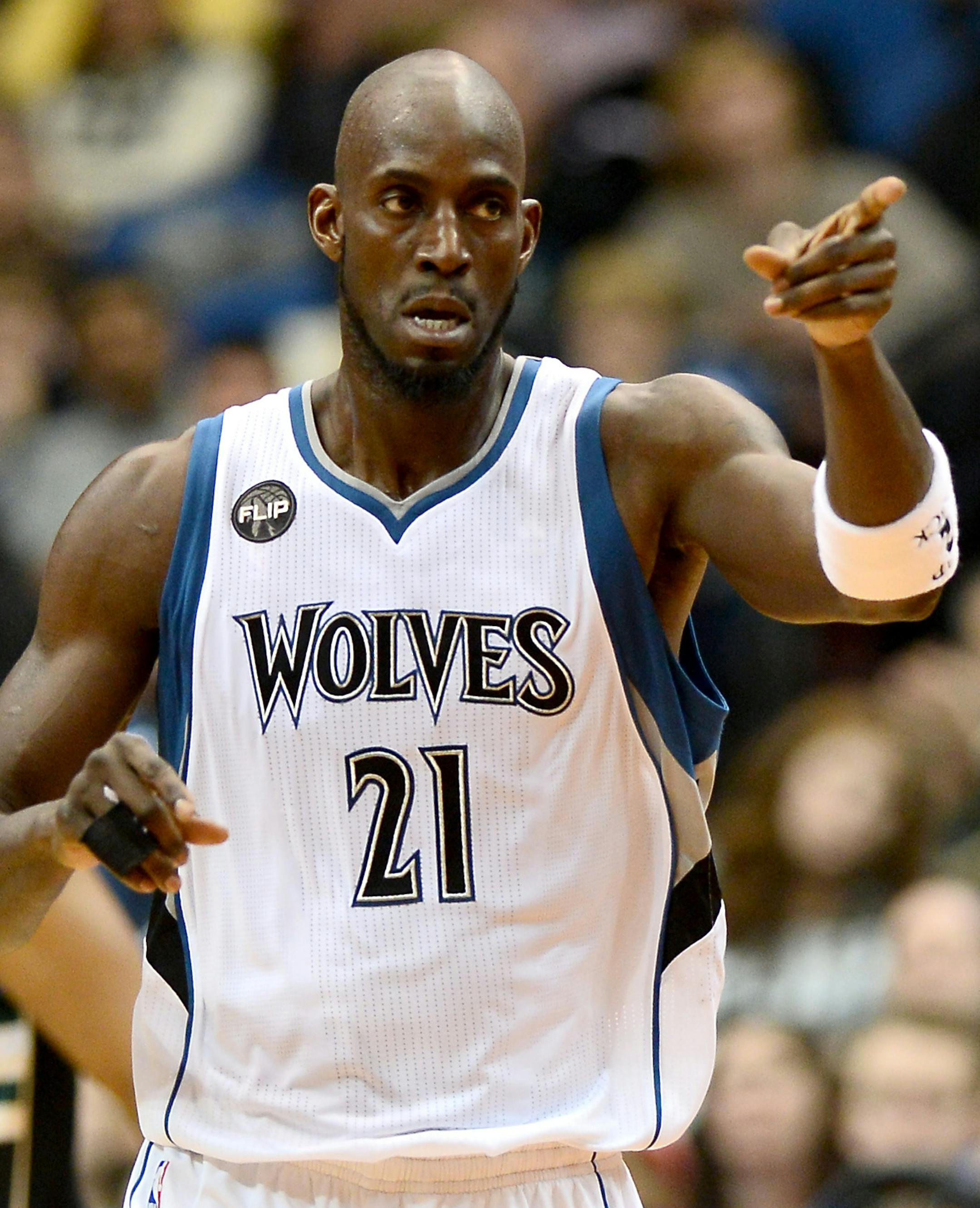 Minnesota Timberwolves forward Kevin Garnett (21) gestured to guard Andrew Wiggins (22) after Wiggins hit a 2-point jump shot in the third quarter. ] (AARON LAVINSKY/STAR TRIBUNE) aaron.lavinsky@startribune.com The Minnesota Timberwolves played the Milwaukee Bucks on Saturday, Jan. 2, 2016 at Target Center in Minneapolis, Minn. ORG XMIT: MIN1601022152160183 ORG XMIT: MIN1606061659352151