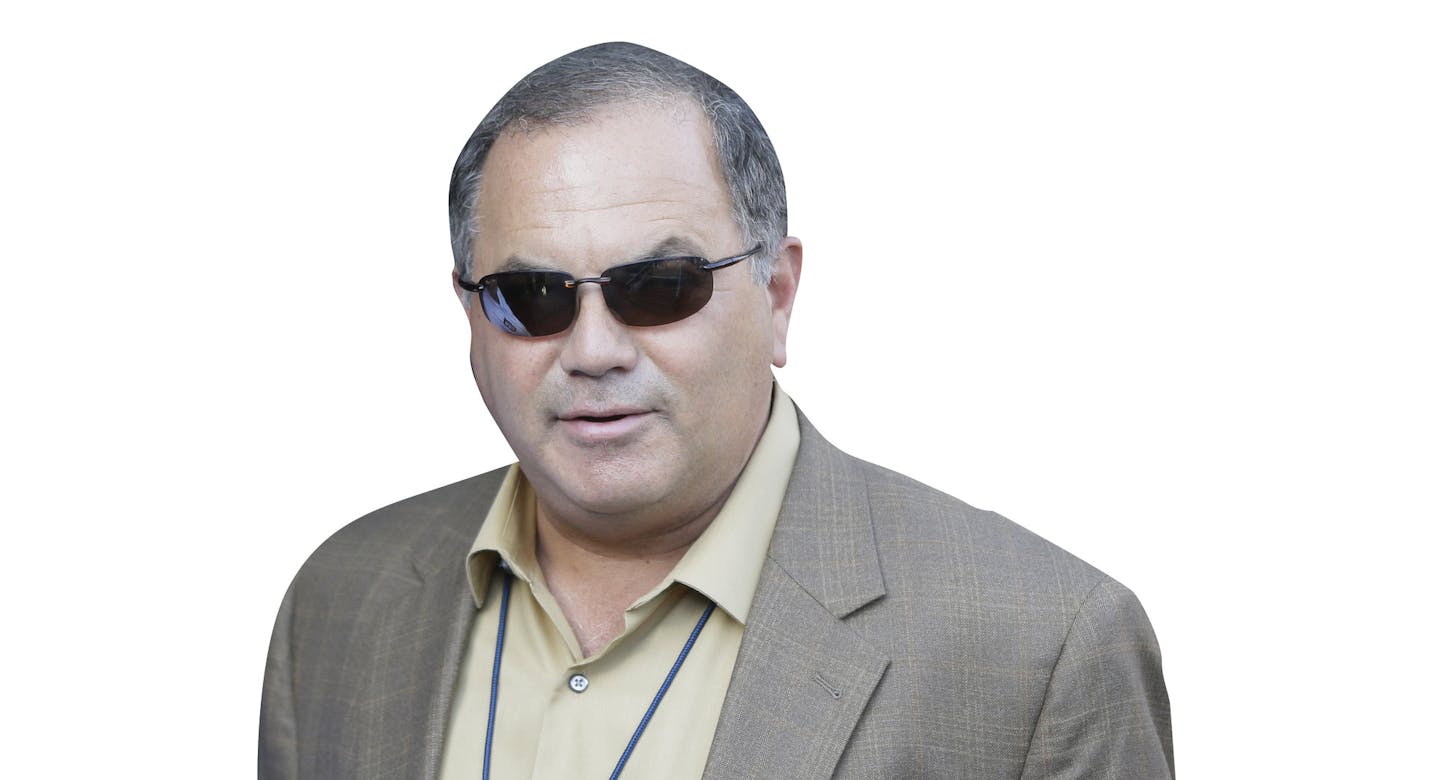 FILE - In this June 8 2014, file photo, Detroit Tigers vice president and assistant general ganager, Al Avila watches before a baseball game against the Boston Red Sox in Detroit. The Tigers announced, Tuesday, Aug. 4, 2015, that Avila has been promoted to the role of executive vice president of baseball operations and general manager. (AP Photo/Carlos Osorio, File) ORG XMIT: NY163