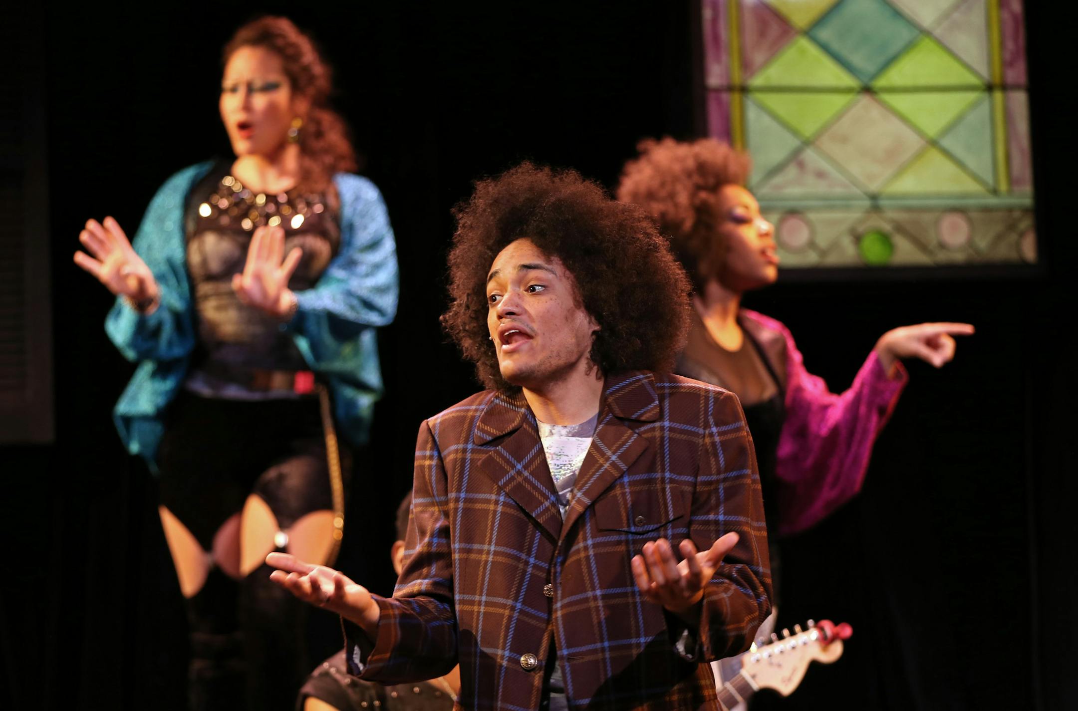 (center) Nathan Barlow and other members of the cast rehearsed a scene from Passing Strange at the Mixed Blood Theatre on 4/18/14. Nathan Barlow, who plays the young rocker in Passing Strange at Mixed Blood, has practically grown up onstage in the Twin Cities. From his first professional show in third grade, when he made his debut at the Guthrie in "A Christmas Carol," through memorable roles at the Children's Theatre and elsewhere, we have witnessed his changes. But for him, the most startling