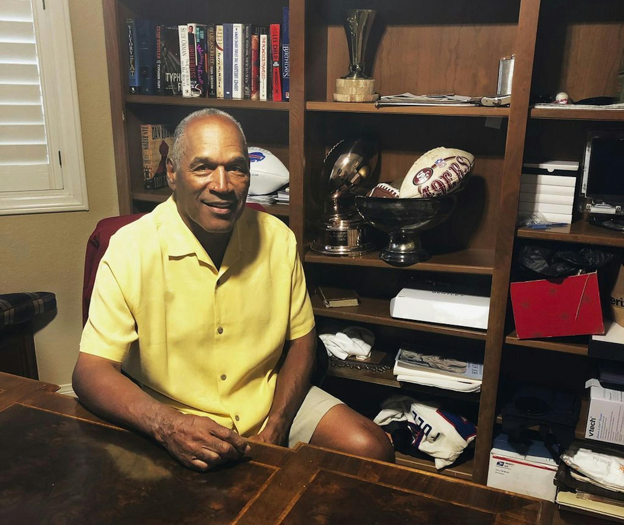 This Thursday, June 6, 2019, photo shows O.J. Simpson in his Las Vegas area home. After 25 years living under the shadow of one of the nation's most notorious murder cases, Simpson says his life now is fine.