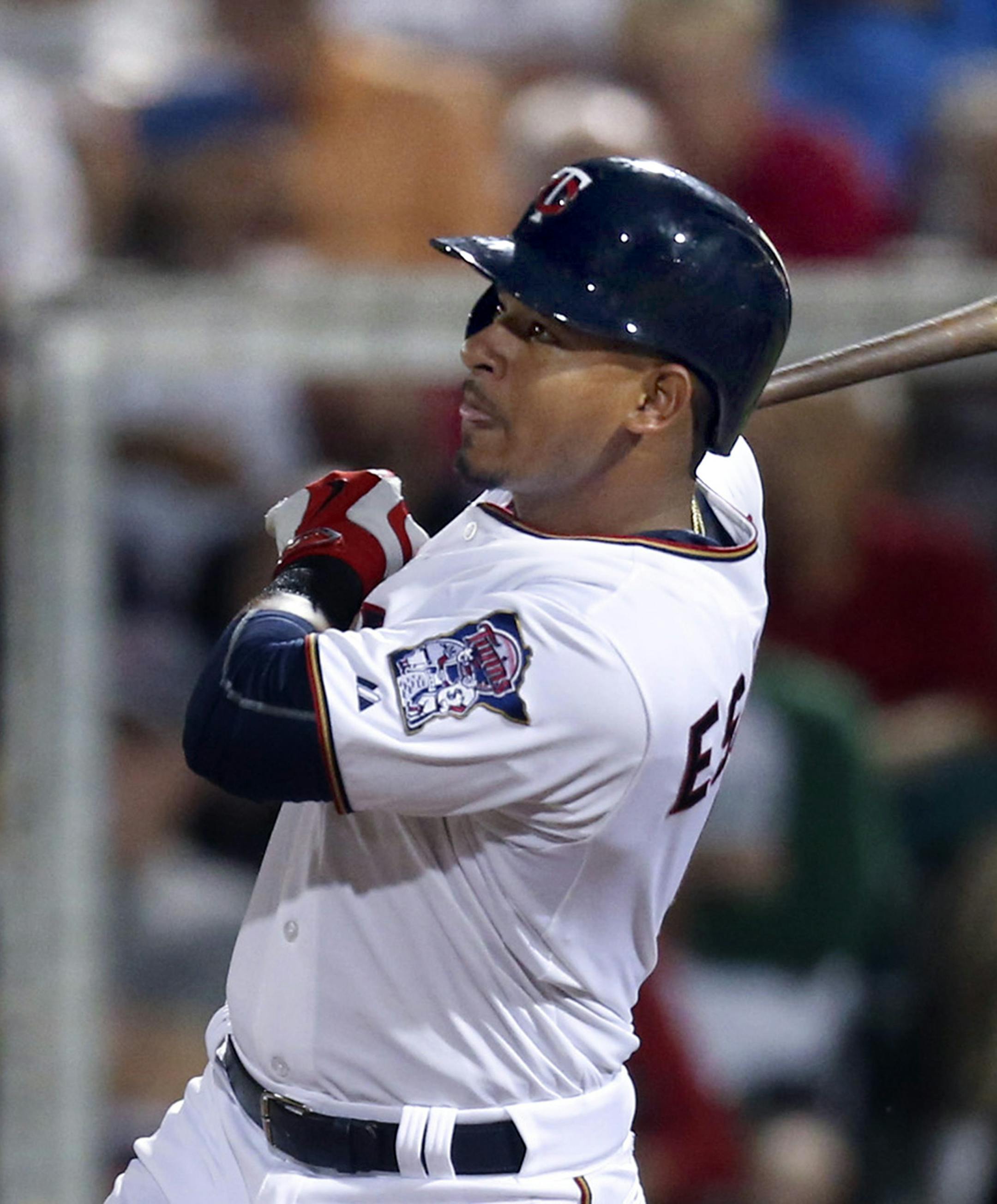 Minnesota Twins shortstop Eduardo Escobar watched his two run homer in the third inning Thursday evening at Hammond Stadium. ] JEFF WHEELER &#xd4; jeff.wheeler@startribune.com The Twins opened their Grapefruit League season against the Boston Red Sox Thursday night, March 5, 2015, at Hammond Stadium in Fort Myers, FL. ORG XMIT: MIN1503052021040518