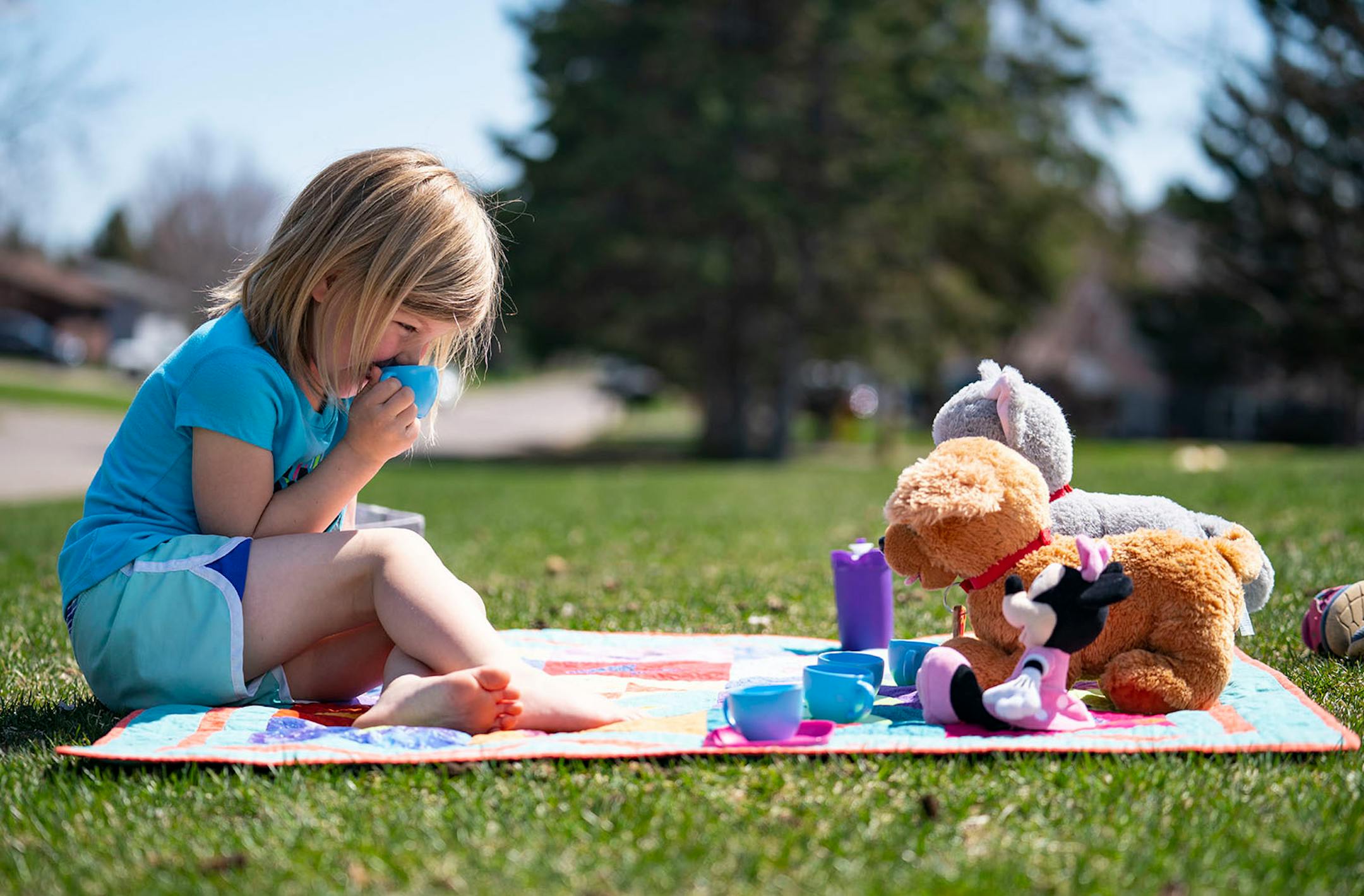 Quinn Montgomery, 5, held a tea party on her front lawn in Duluth. The virus is a little hard for Quinn to fully grasp but she understands that it is an invisible threat to people. "So if it's floating outside and when you open the door to let it come in, I'm scared if one of us gets sick," Quinn said. She finds happiness and serenity during this time by having tea parties and jumping in her trampoline.