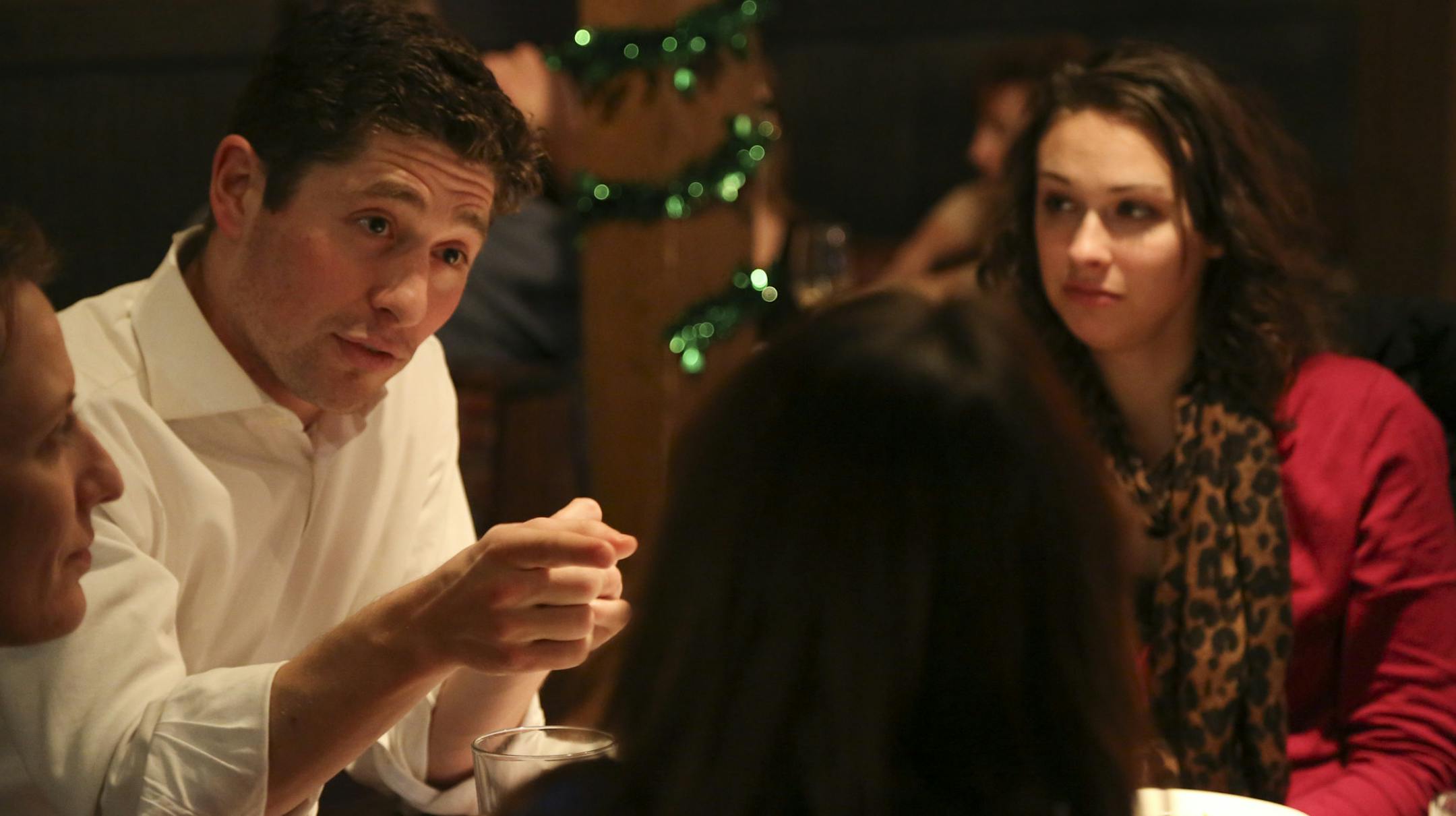 With University of Minnesota student Kelsey Sievers, right, listening, Jacob Frey, who is running for Minneapolis city council third ward, talked to students and recent graduates about his plans for Minneapolis during a meet and greet with the group Students for Frey at the Blarney Pub and Grill in Minneapolis, Min., Thursday, February 28, 2013. ] (KYNDELL HARKNESS/STAR TRIBUNE) kyndell.harkness@startribune.com