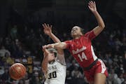 Two young standouts who will play in the state tournament, Minnehaha Academy sophomore Sinae Hill (14) and Providence Academy sophomore Maddyn Greenwa