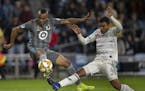 Minnesota United forward Angelo Rodriguez (9) missed a chance at a goal as Eddie Segura of Los Angeles defended Sunday at Allianz Field.