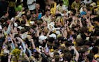 Wake Forest's Matthew Marsh (33) celebrated with fans after the Demon Deacons beat Duke on Saturday.