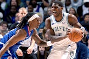 Wolves star Anthony Edwards tried to keep the ball away from Clippers defender Terance Mann during Sunday's 89-88 loss to Los Angeles at Target Center