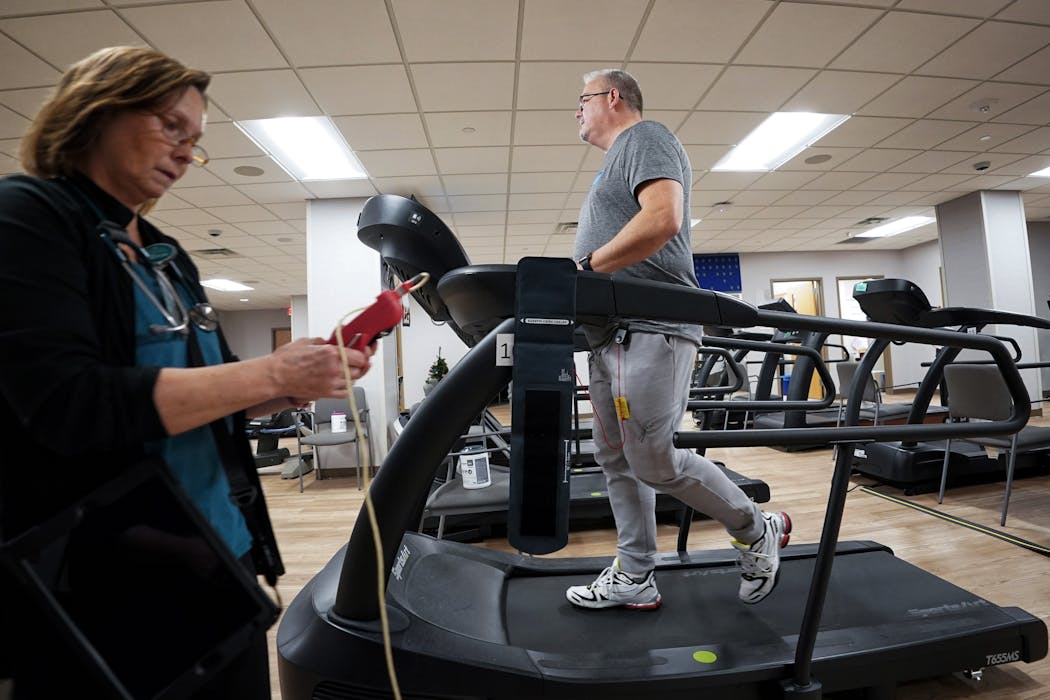 Brian Molohon worked with cardiac rehabilitation therapist Teri Thorstad during his outpatient cardiac rehab session.